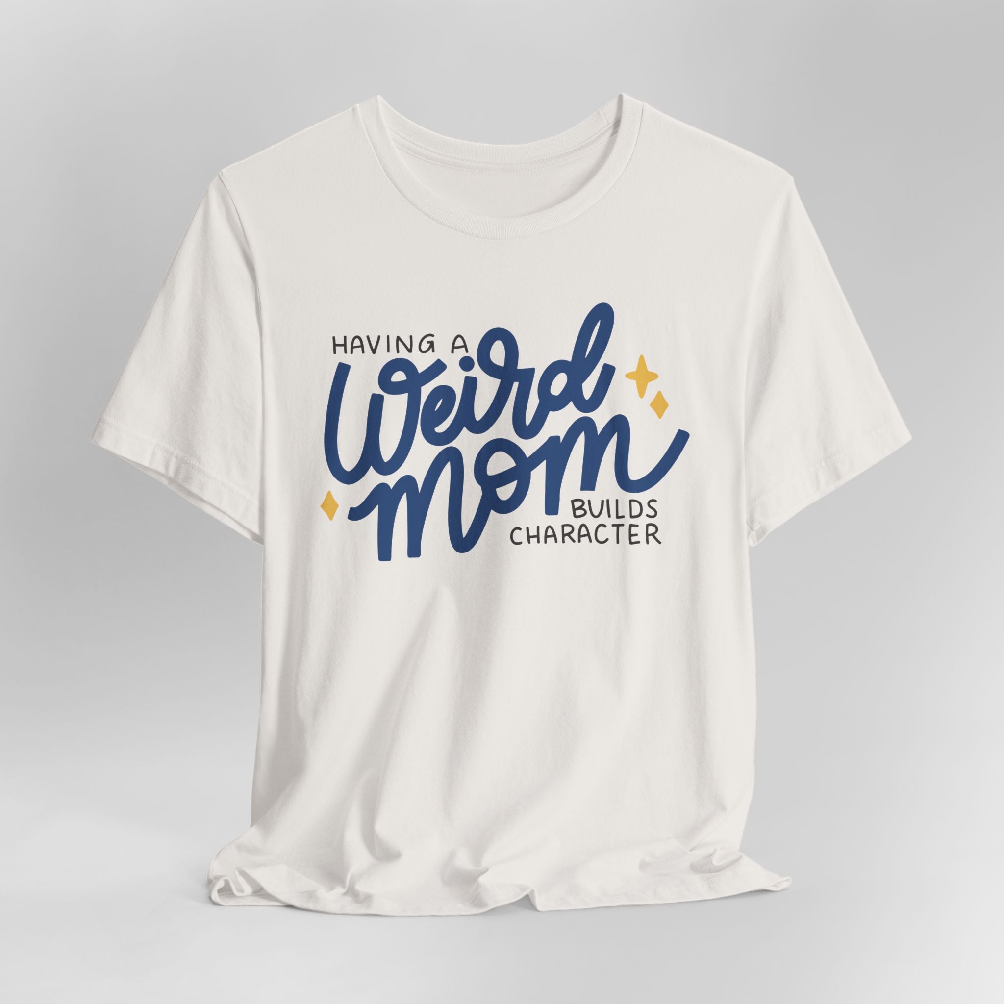 Having a Weird Mom Builds Character Graphic Tee